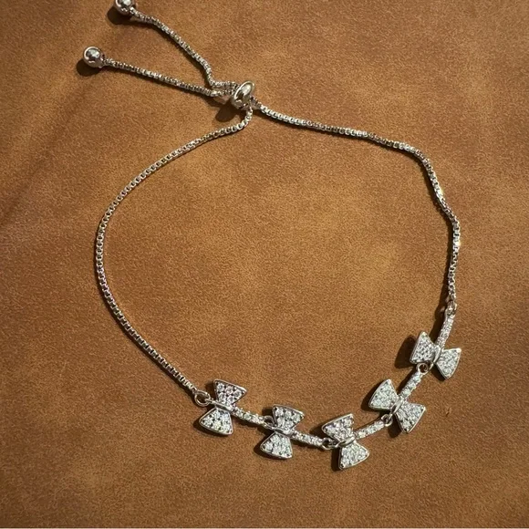 NWOT Kite Tail Bows 18K White Gold Plated CZ Box Chain Lariat Bracelet - Picture 2 of 3